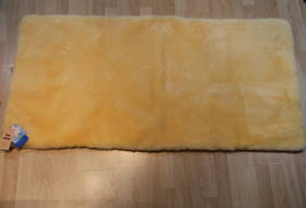 Betteinlage aus Lammfell der Extra Klasse 140 x 70 cm mit Schutzstoff